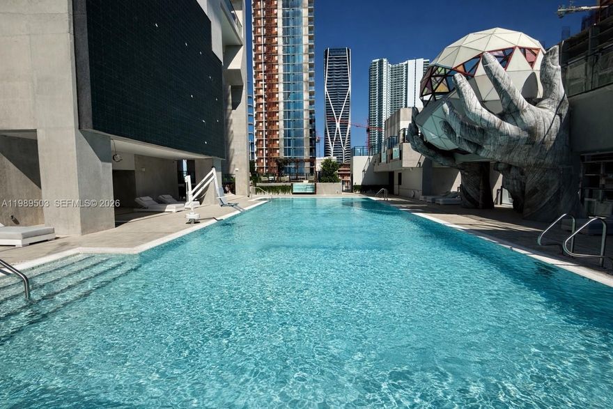 Fully furnished, turnkey residence in one of Miami’s most sought-after new construction developments, E11EVEN Residences Miami. Located in the centrally positioned Park West District, this 65-story tower offers short-term rental flexibility with daily leasing permitted.
The unit features panoramic views of the Miami skyline with modern finishes and a thoughtfully designed layout.
Residents enjoy a full-service lifestyle 24/7 with amenities including a modern lobby, curated art installations throughout the common areas, a sports lounge with stadium-style seating and LED video wall, a fitness center, spa and wellness spaces, yoga and meditation areas, bar and lounge, and a multi-level pool deck with cabanas overlooking the city.
Private beach access is available for owners.