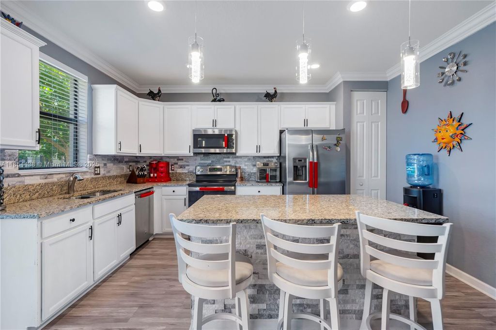 Photo of 6970 Broadland Way, Coconut Creek, FL 33073 (MLS # A11854438)