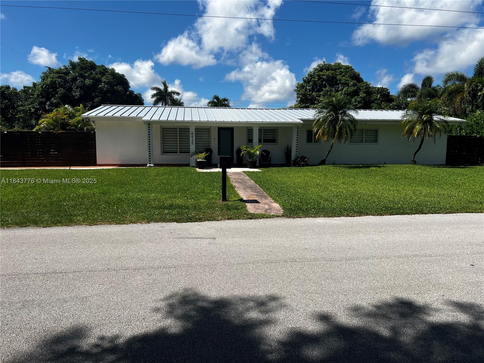 Bigger than tax roll 2630sq Beautiful ranch house in Palmetto Bay with new aluminum roof and impact doors and windows
Ac is about 2 years old ,updated
4/3. 2 car garage family room , extra room works as an office
Tesla charger , great pergola with full concrete grill