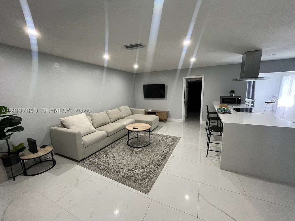 Photo of 9162 NW 26th Pl, Sunrise, FL 33322 (MLS # A12092849)
