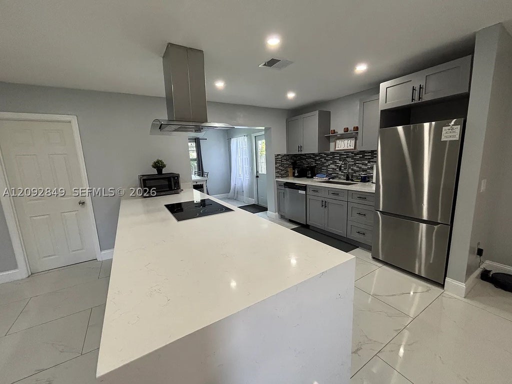 Photo of 9162 NW 26th Pl, Sunrise, FL 33322 (MLS # A12092849)