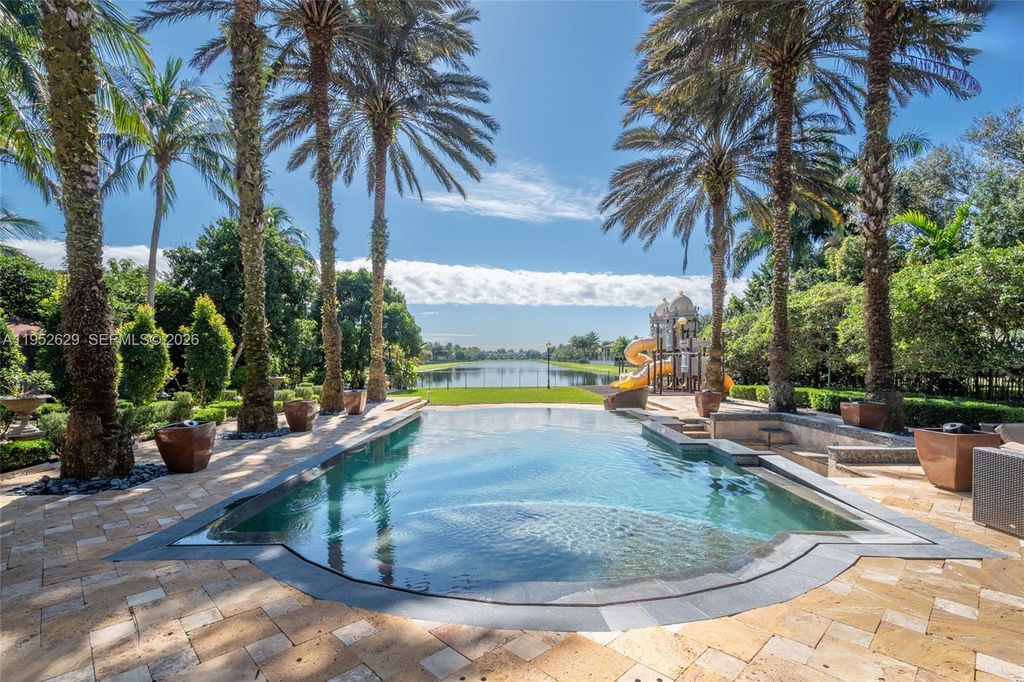 Photo of 11356 Canyon Maple Blvd, Davie, FL 33330 (MLS # A11952629)