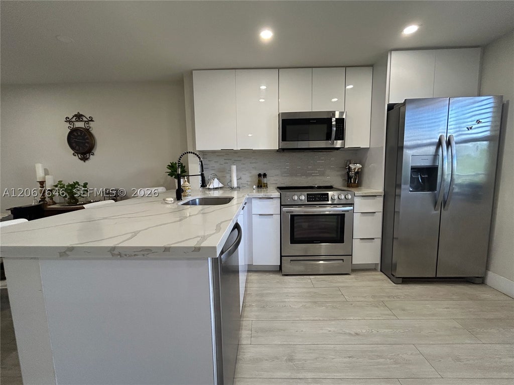 Photo of 10130 Sunrise Lakes Blvd #207, Sunrise, FL 33322 (MLS # A12067646)