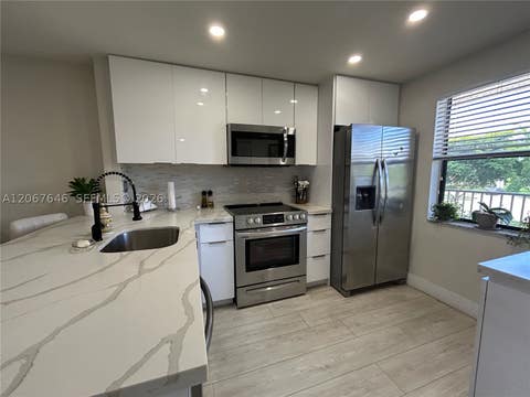 Photo of 10130 Sunrise Lakes Blvd #207, Sunrise, FL 33322 (MLS # A12067646)