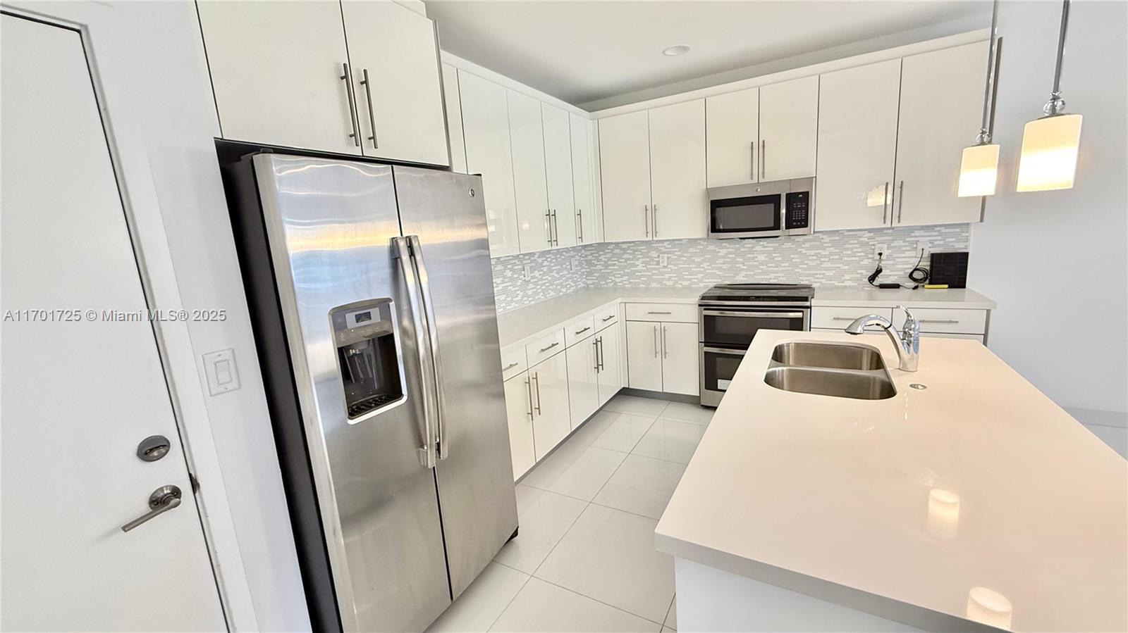 WEITZER AVENTURA PLACE CO - Residential