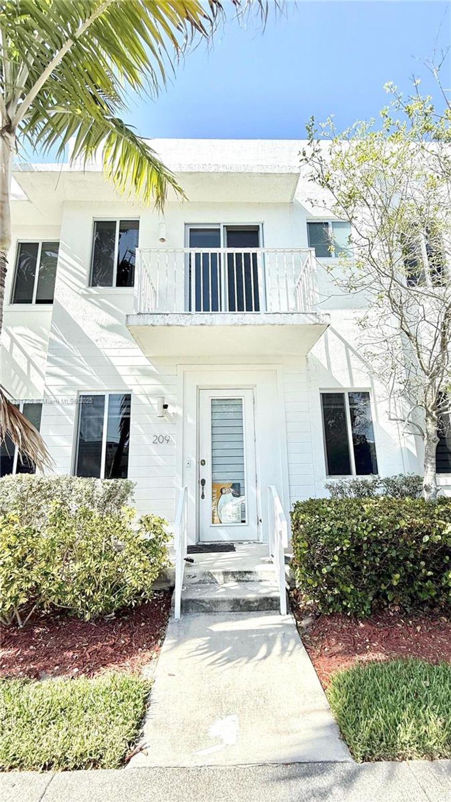 This pristine 3 bedroom, 2.5 bath, two car garage townhome is centrally located in Aventura Place and offers a great open floorplan. First floor features a huge kitchen with an island overlooking the dining & living area. Stone countertops, 24"white porcelain tile. Rich hardwood staircase leads to all spacious bedrooms & laundry area upstairs. Primary suite includes an oversized walk in closet & balcony. Big open landing used as a home office. Volume ceilings, plenty of storage space & natural lighting. Condo fees include building exterior, basic cable, alarm & pool. Plenty of guest parking. Impact Windows and Doors. 1 block away from Waterways, the best School in Aventura. Close to Aventura Mall, Aventura Hospital, restaurants, shops, airport, beaches & major highways.