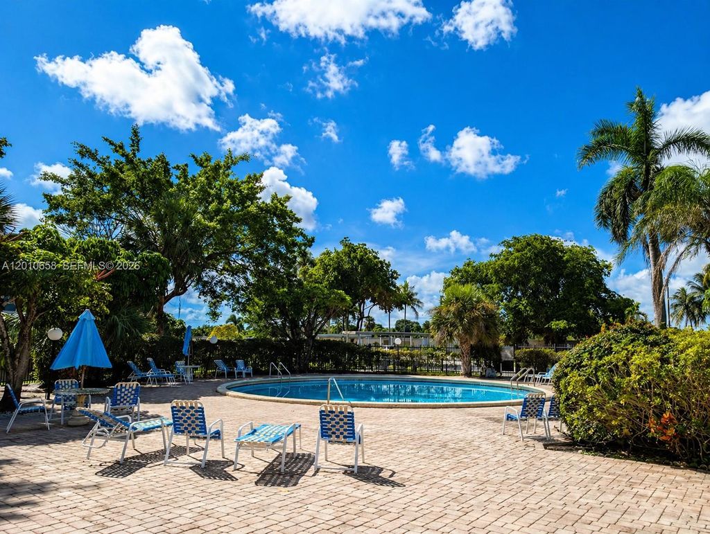 Photo of 5950 Del Lago Cir #104, Sunrise, FL 33313 (MLS # A12010658)