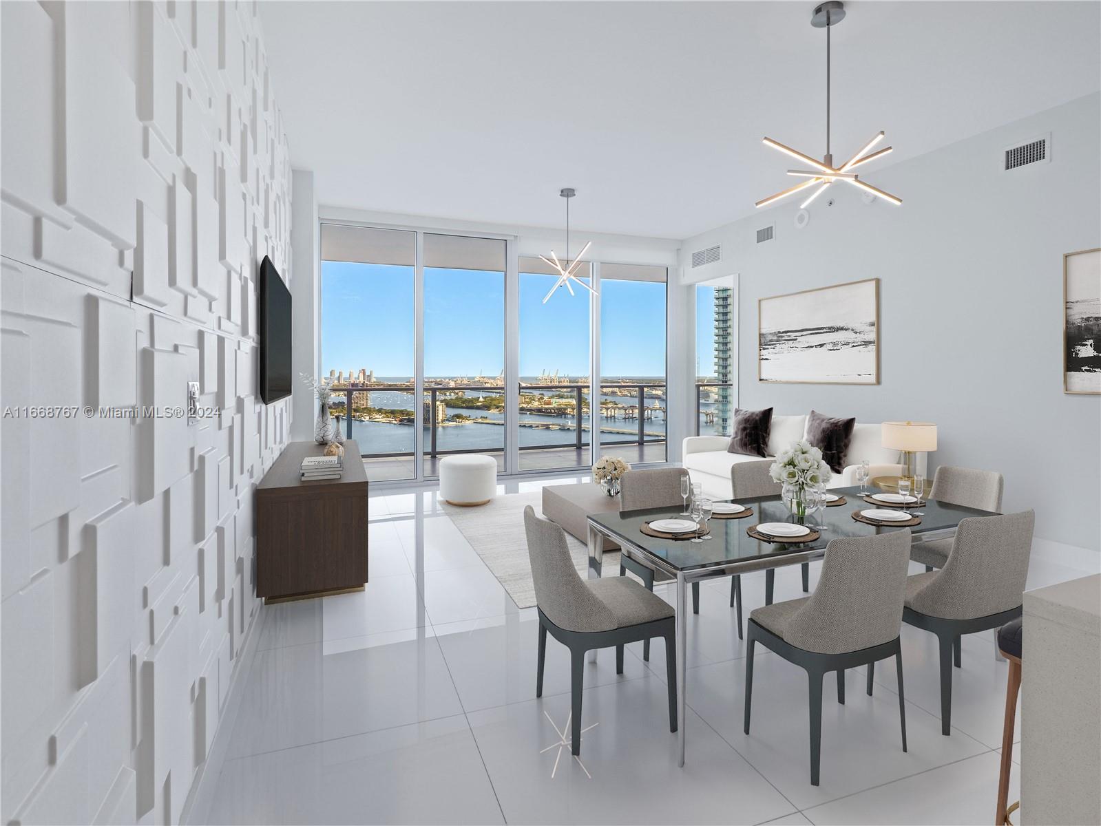 Welcome to waterfront luxury living at Paramount Bay! This exquisite 2-bed, 2 1/2-bath plus den residence offers spacious, modern interiors adorned with high-end appliances, all complemented by a breathtaking bay view. Conveniently situated just 12 minutes from Miami Beach and adjacent to Wynwood and the Design District, it seamlessly combines opulence with a prime location. Indulge in exclusive amenities including a state-of-the-art gym, pristine pool, well-equipped business center, and a delightful playroom for children. Experience the epitome of Miami's cosmopolitan lifestyle at Paramount Bay. Two parking spaces and a large storage included!