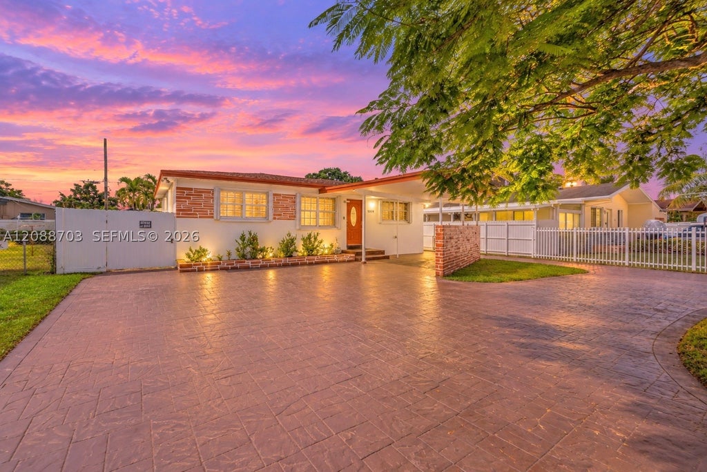 Photo of 6508 Plunkett St, Hollywood, FL 33023 (MLS # A12088703)