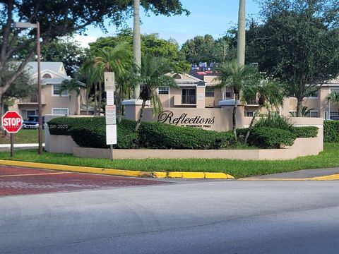 Photo of 2091 NW 96th Ter #13A, Pembroke Pines, FL 33024 (MLS # A11870088)