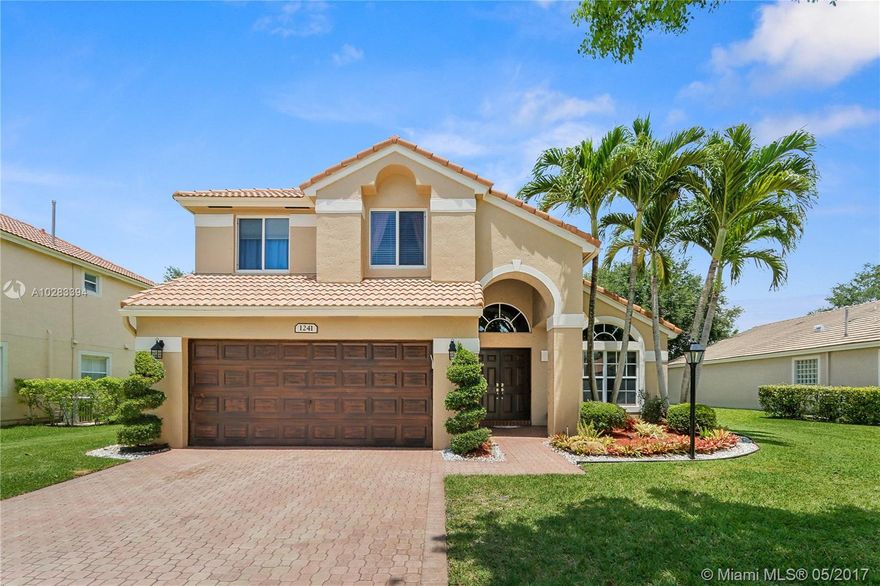 Bright & Airy 4 Bedroom, 2.5 Bath, Malibu Model Pool Home in Prestigious Pembroke Falls – Pelican Trace. Featuring: Maple Cabinetry, Corian Countertops, Stainless Steel Appliances, Gas Range, Spacious Master Suite, Walk-in Closet, Vaulted Ceilings, Dual Vanities, Soaking Tub, Neutral Tile & Laminate Flooring Throughout, New A/C, New Water Heater, Expansive Patio, Refreshing Free Form Salt Water Pool w/Tanning Ledge, Swimout, Water Feature & Led Lighting, Natural Gas BBQ Hook-Up, Tropical Landscaping & Fenced Yard, Freshly Painted Exterior & IMPACT FRENCH DOORS & WINDOWS!!!! Five Star Resort Style Club House: Ballroom, Heated Pool, Spa, Gym, Tennis, Basketball, Tot-Lots, 4–24hr Manned Security Entrances.  HOA includes: Fiber Optic HD Cable, Wireless Internet & Alarm Monitoring. Call Today!!