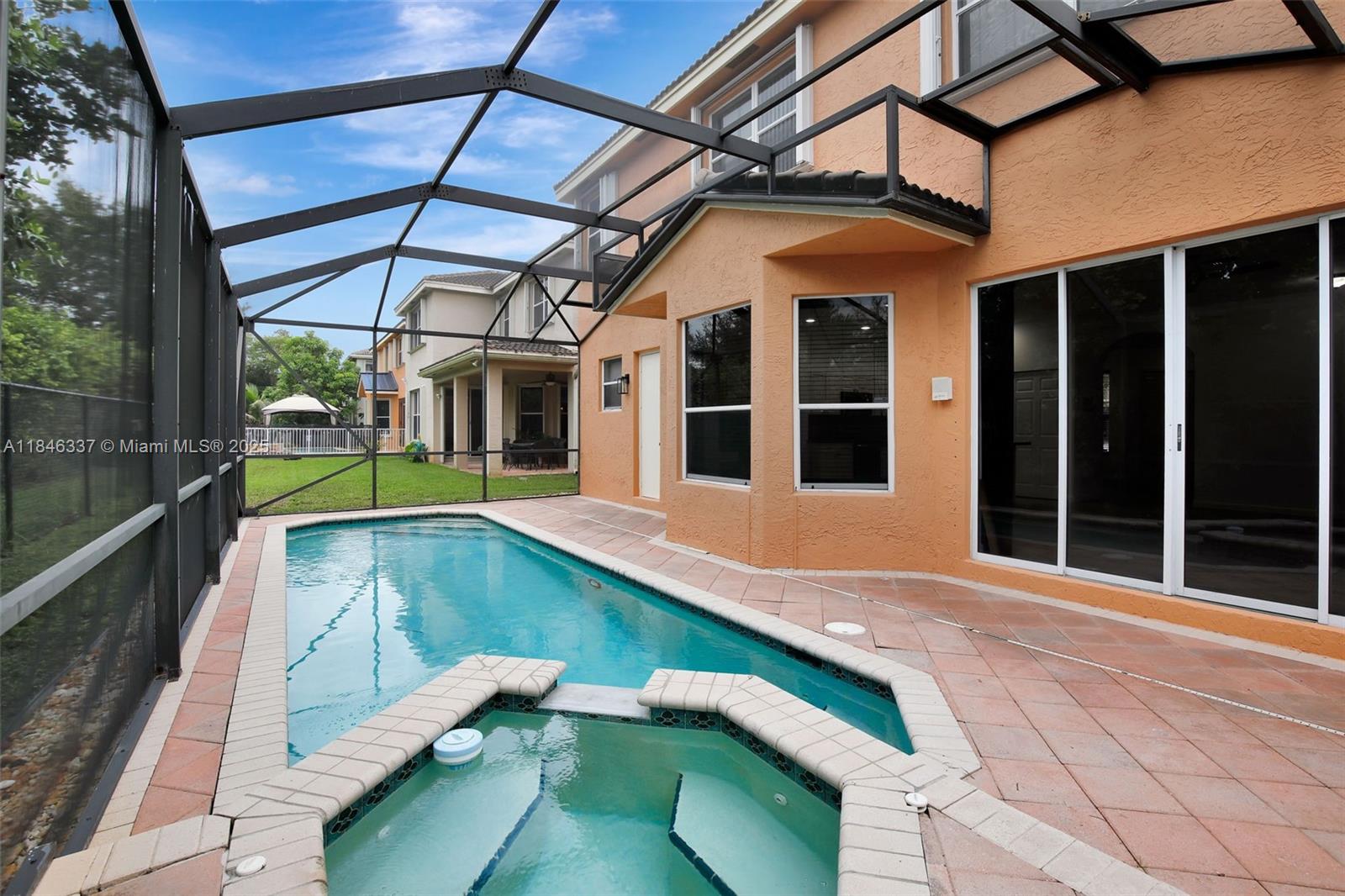 Gorgeous 5 Bedrooms 4 Baths with Screened-in Pool/Hot Tub. In SILVER SHORES Gated Community. Amazing In-Law Quarter with 1 Bedroom, 1 Bath, large Living/TV-Room, private entrance and pool access. Main Home has a beautiful Double Door into the Living Area, large entertaining Family-Room, Breakfast area, Kitchen with access to screened-in pool. On 2nd floor, Main Bedroom has a separate sitting or office, 2 Walk-In Closets, has separate His and Hers bathrooms. Down the Hallway there are 3 bedrooms, Laundry room with a sink. Painted both Interior and Exterior. Amenities include Resort-style Pool, Gym, Tennis, Basketball Courts, Clubhouse, 24 HR Security, great shaded sidewalks for long walks. Near highway, restaurants, shopping areas, very short walking distance to Elementary School.