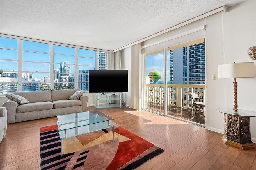 Panoramic windows facing to the northeast side. 3 walk-in closets and additional storage spaces. The balcony offers full privacy - you can't see the neighbors. An intercostal-view swimming pool and gym are in the complex. Directly across the street from the beach, ocean, and a children’s playground. Walking distance to Publix and Walmart. Excellent association, well-maintained building. The complex has reserves. NO SPECIAL ASSESSMENTS. 40&50 years inspection completed. The roof was repaired in 2023. Wi-fi included in HOA. No rent first 2 years. The unit is being sold AS-IS with the right to inspect.