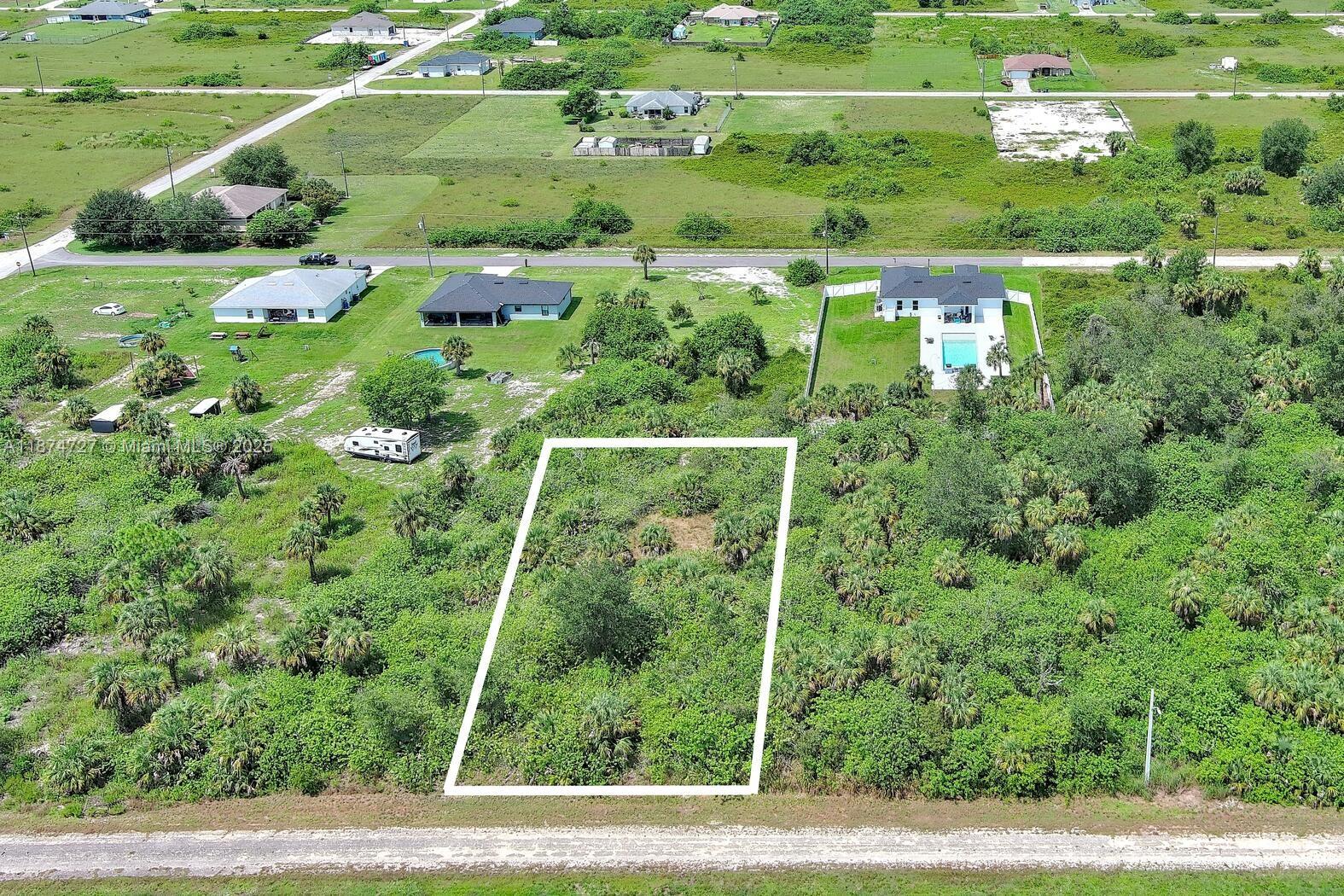 Exclusively presented by Sunland Real Estate: Build your dream home on this spacious 0.50-acre lot located at 1507 Hines Ave, Lehigh Acres, FL 33972. This property offers ample space for a custom residence, pool, or outdoor living area, all while enjoying the peace of a growing community. Conveniently situated near shopping, dining, schools, and major roadways for easy access to Fort Myers and the surrounding areas. Don’t miss this opportunity to own a piece of Florida living!