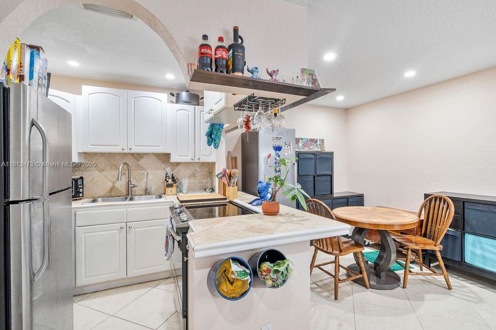 Photo of 3032 Coral Ridge Dr #217C, Coral Springs, FL 33065 (MLS # A11812473)