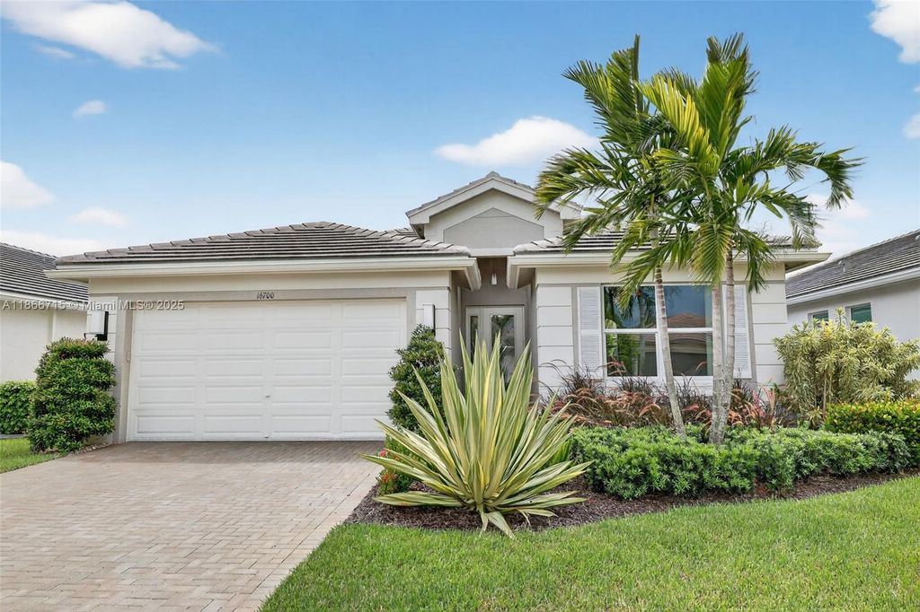 Photo of 16700 SW Osprey Falls Way, Port St Lucie, FL 34987 (MLS # A11866715)