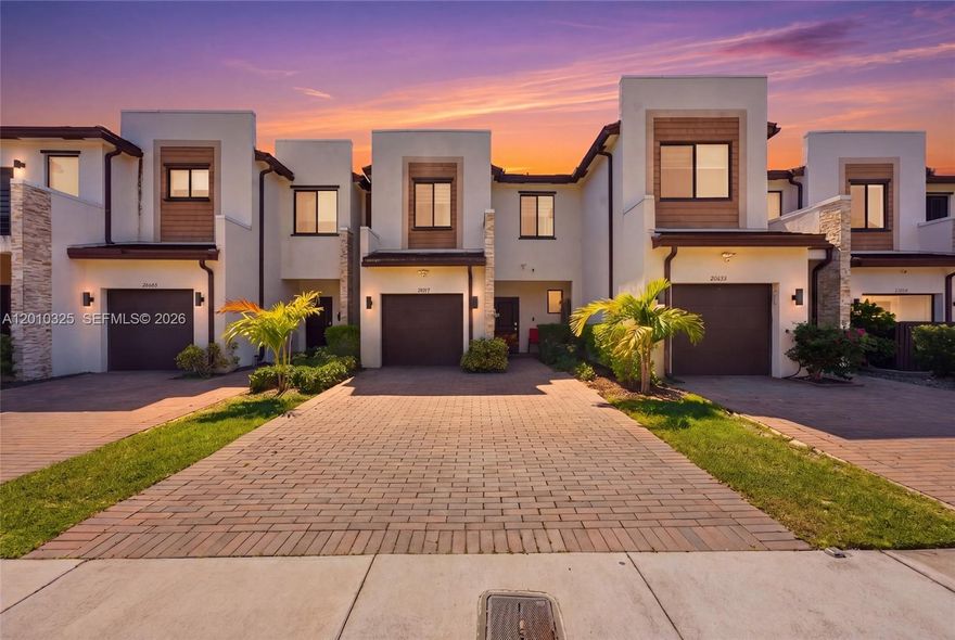 Lakefront 3-bedroom, 2.5-bath townhouse with garage in the gated community of Paseos at Via Ventura. Functional two-story layout with all bedrooms on the second level, tile flooring on the main level, and a clean, open living space that flows into the kitchen overlooking the water. 

Step outside to your spacious private patio and enjoy direct waterfront views, perfect for unwinding or hosting guests. The attached garage includes its own AC unit, offering flexibility for a home gym, workspace, or additional storage.

Residents benefit from a very low HOA while enjoying resort-style amenities including a clubhouse, pool, fitness center, and playground within a secure, gated community. 

Perfectly located just 2 minutes from I-95, under 5 minutes to Aventura Mall, and approximately 15 minutes to South Florida’s best beaches, this home offers unmatched accessibility to shopping, dining, and entertainment. Whether you’re searching for a primary residence or a strong investment opportunity, this move-in ready waterfront property checks every box.