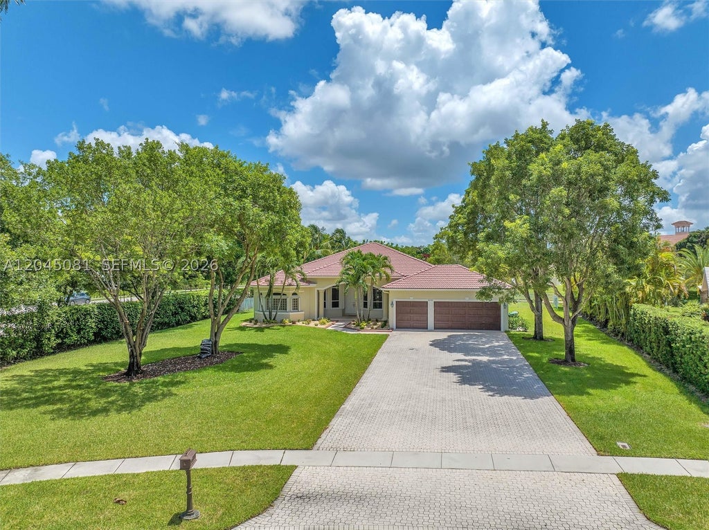 Photo of 16310 Paddock Ln, Weston, FL 33326 (MLS # A12045081)