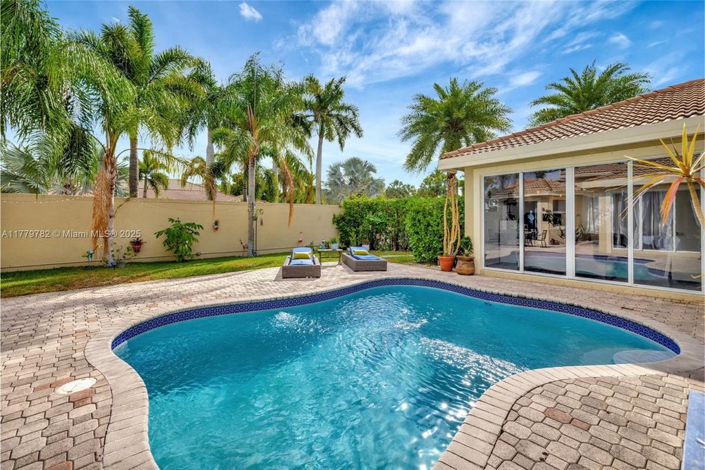 Photo of 5865 NW 125th Ave, Coral Springs, FL 33076 (MLS # A11779782)