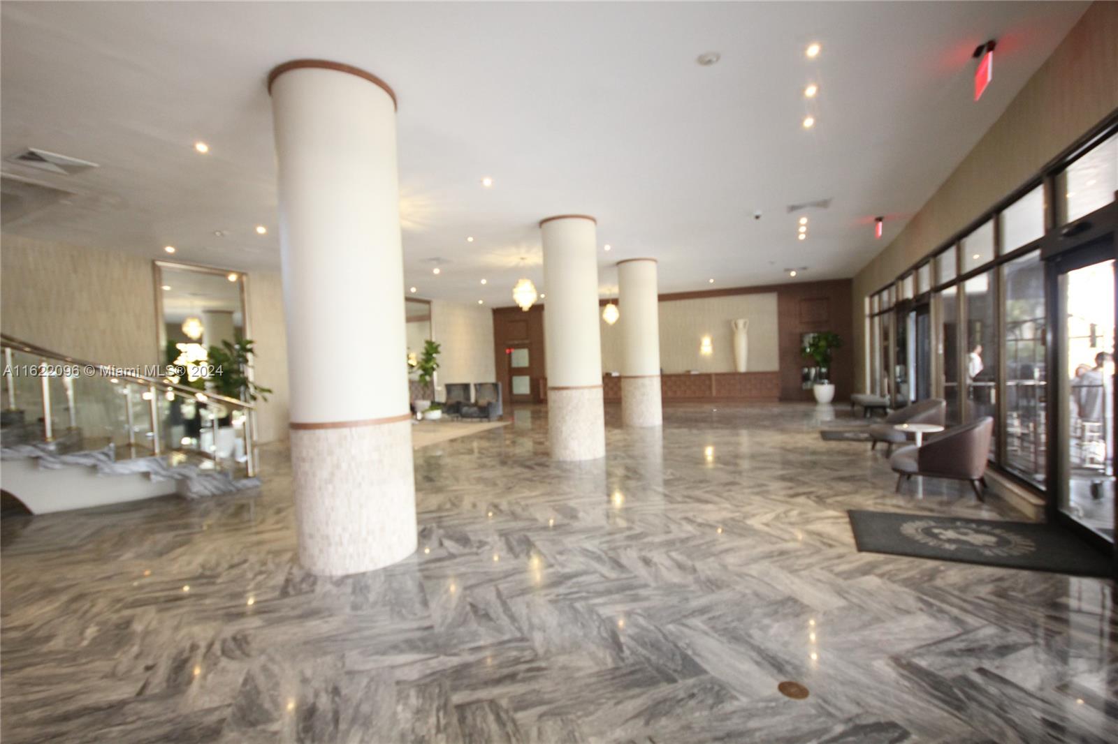 THE CARRIAGE HOUSE CONDO - Residential