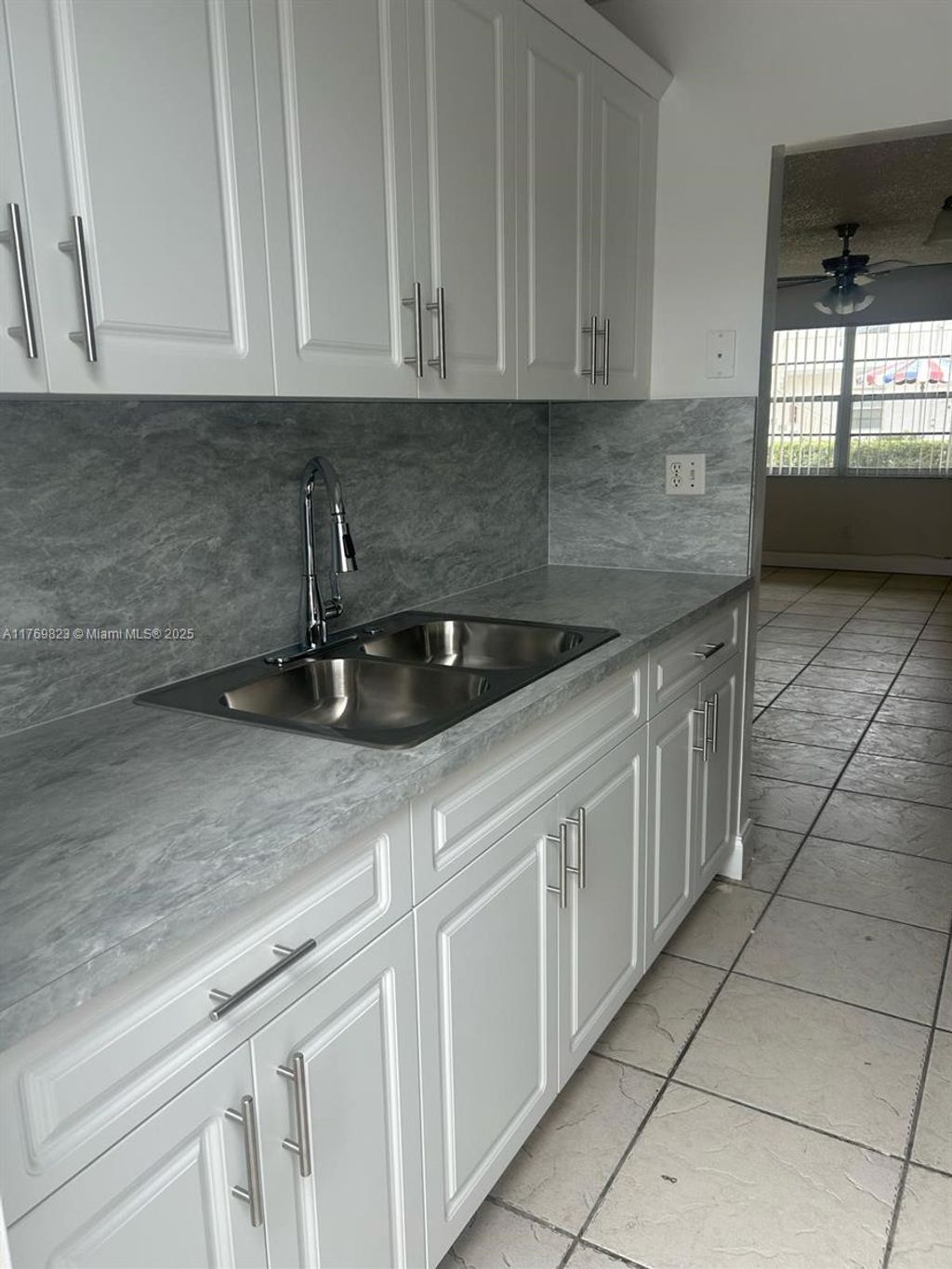 Photo of 6191 SW 37th St #105, Davie, FL 33314 (MLS # A11769823)