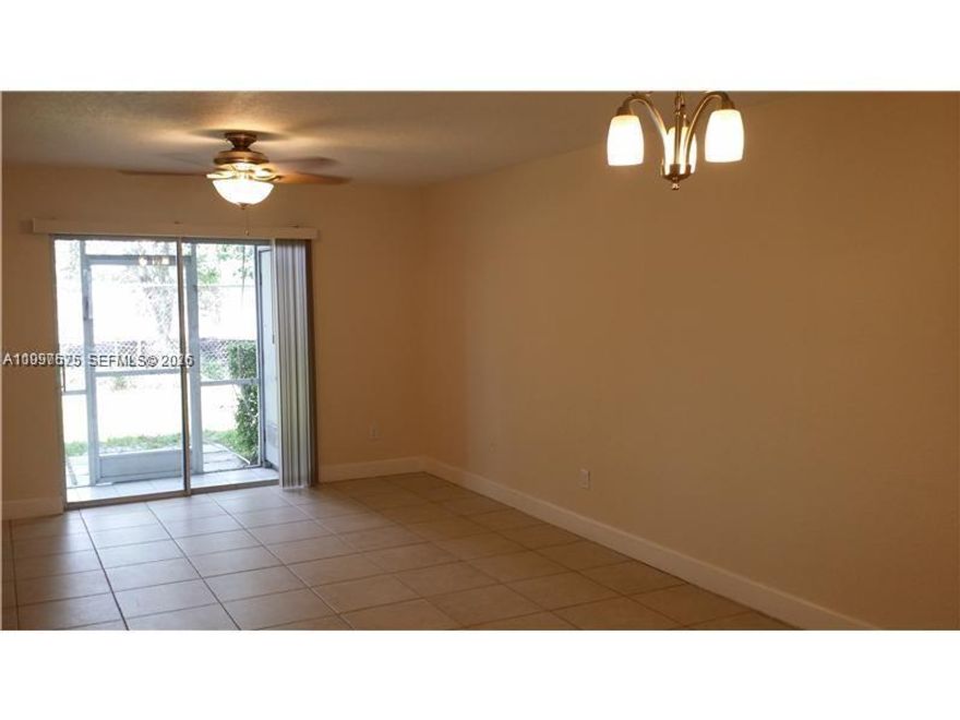 Updated and Spacious unit  first floor . Updated Bathroom and Kitchen  cabentry . Tiles floors through intire unit . Walk In closet .Washer AND dryer . Tenant is responsable for water and sewer