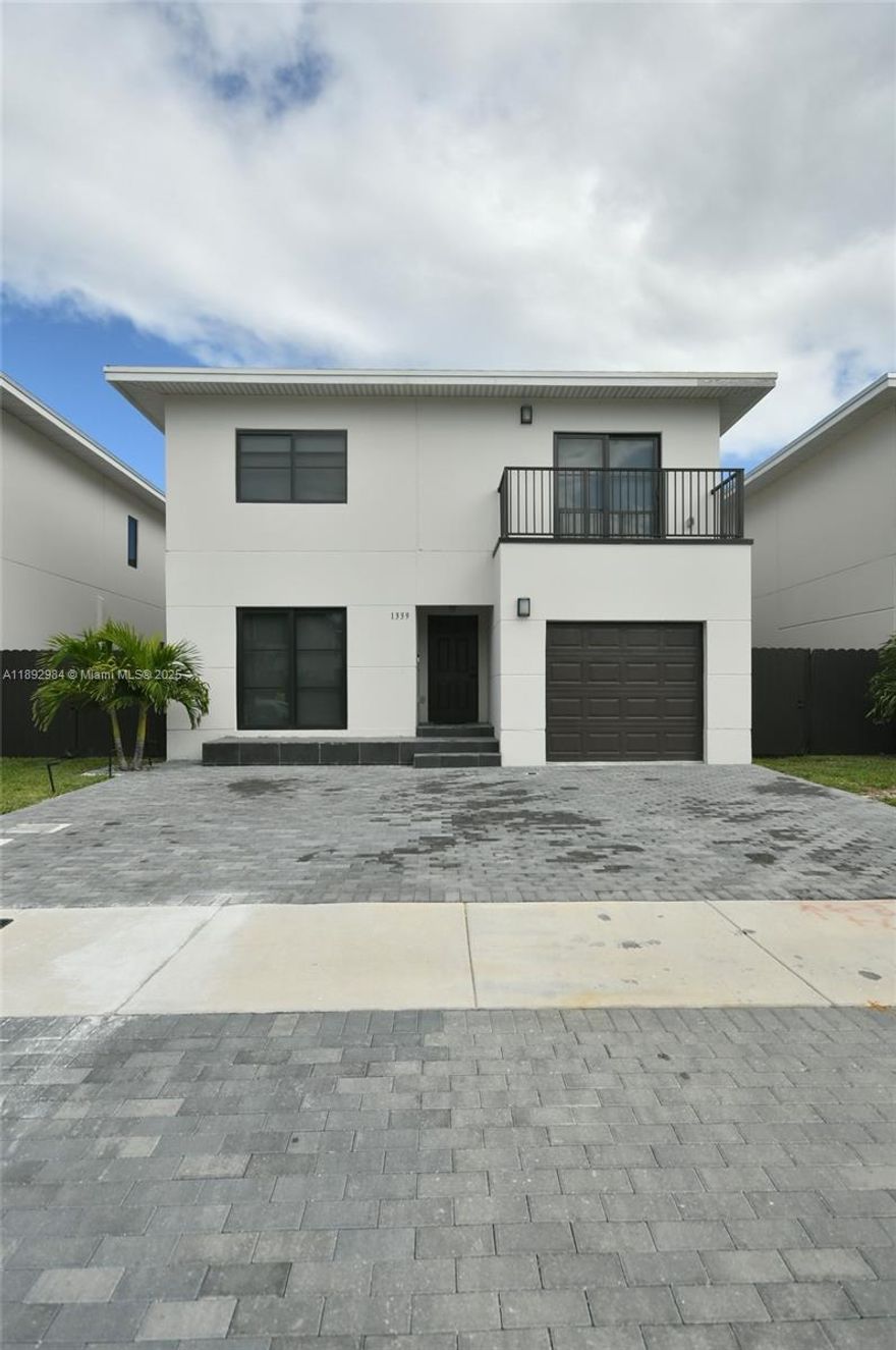 Beautiful 5-bedroom, 3-bath home for rent in the sought-after Alba community, built 2024! Enjoy modern living with impact windows & doors, combo of porcelain tile Y laminate flooring, open-concept kitchen with modern quartz countertop, SS appliances & automatic roller shades throughout. Abundant natural light, creating an inviting atmosphere. 1 bedroom and full bath on the first floor plus 4 spacious bedrooms and 2 baths upstairs, ideal for comfort and flexibility. Concrete construction ensures strength & safety. Step outside to a brick patio with new lawn, perfect for entertaining, and an extended driveway for 3 vehicles. Pet-friendly, move-in ready, and built for today’s lifestyle. Conveniently located near shopping, dining, and major access roads. Schedule your private showing today!