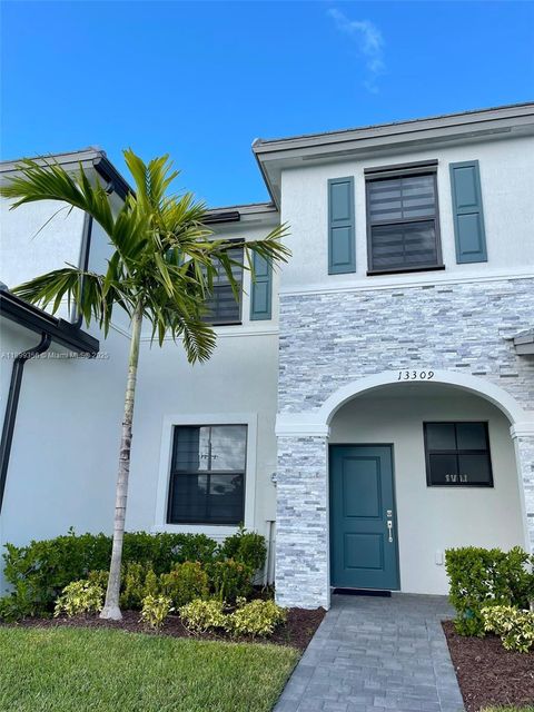 Photo of 13309 SW 287th Ter, Homestead, FL 33033 (MLS # A11899356)