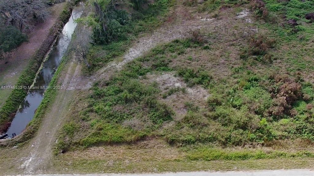 Photo of 157xx N 99th Ct, Loxahatchee, FL 33412 (MLS # A11745313)