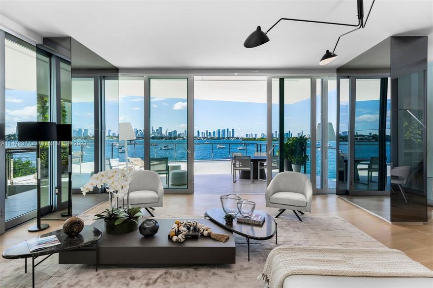 Welcome to this waterfront South Beach residence by Ateliers Jean Nouvel, offering direct views of Biscayne Bay with breathtaking sunsets. This exquisite home features a private foyer, an open layout with floor-to-ceiling windows, custom wood floors, a kitchen with a cantilevered marble island, Gaggenau appliances, a custom marble wine rack, & Poliform closet & kitchen elements. An indoor/outdoor oasis w/ a unique staircase providing direct pool access and expansive private garden terraces for each room. Custom bathrooms boast stone-tiled walls, a floating wood vanity, & Calacatta gold showers. Nouvel seamlessly engineered environmental & innovative climate resilience into the building’s architecture. Amenities include 24-hour concierge, pool service, sun deck, residents' lounge & more.