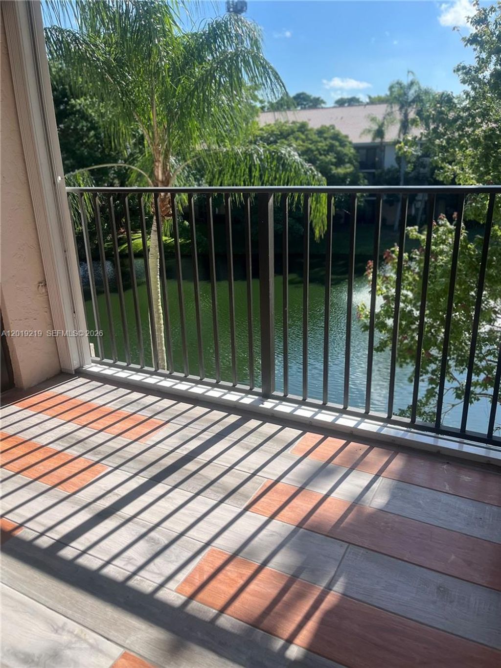 Photo of 10121 W Sunrise Blvd #301, Plantation, FL 33322 (MLS # A12019219)