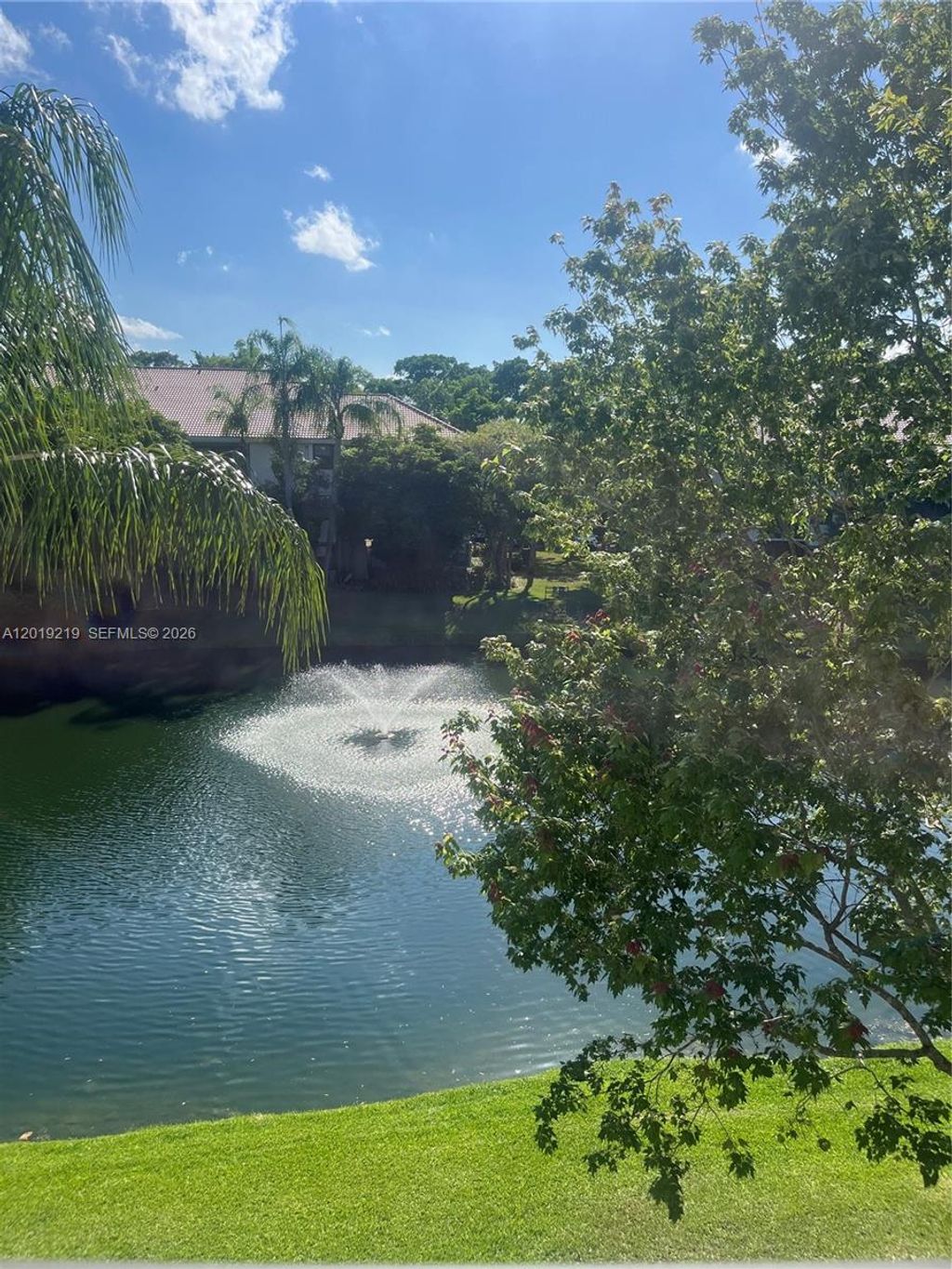 Photo of 10121 W Sunrise Blvd #301, Plantation, FL 33322 (MLS # A12019219)