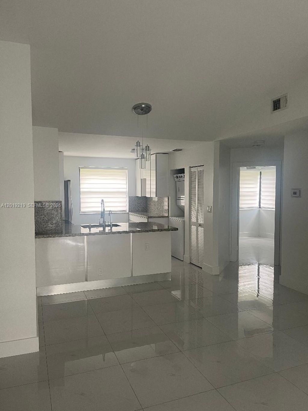 Photo of 10121 W Sunrise Blvd #301, Plantation, FL 33322 (MLS # A12019219)