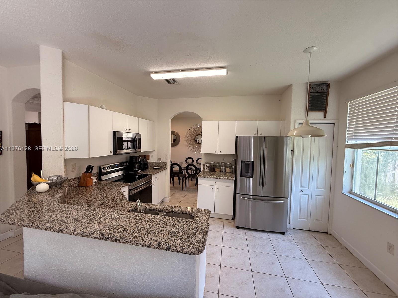 ISLANDS AT DORAL TOWNHOME - Residential