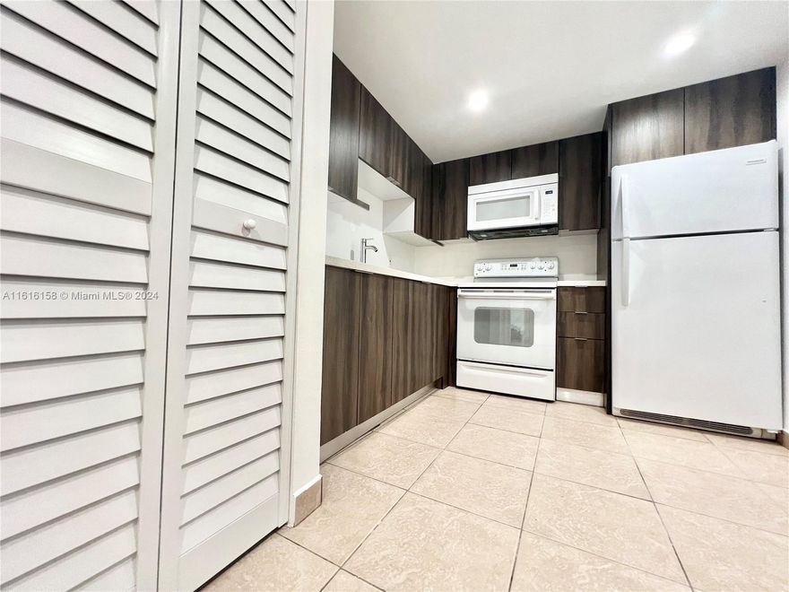 Bright and Spacious 2 Bedroom, 2 Bathroom Condo. Freshly painted and sparking clean for the new tenant. Each bedroom has its own new remodeled bathroom. Washer and dryer in unit. This unit has one assigned parking, and one additional parking will be provided by the condo association. Water is included. Parking space 401. Section 8 welcome! Close to FIU, Express Way, Restaurants, Super Market... Call me or text me for showings.