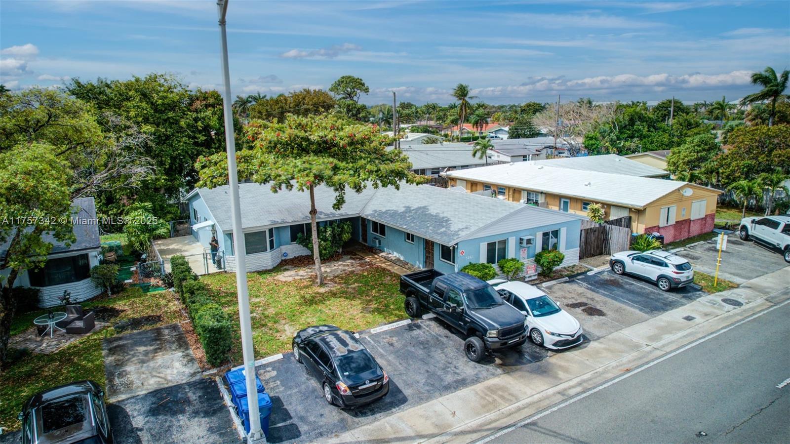 This offering presents a compelling investment opportunity to acquire a well-maintained four-unit multi-family property in the highly desirable Coral Ridge Isles neighborhood of Fort Lauderdale, Florida. This property delivers strong current income, coupled with significant long-term appreciation potential due to its prime location and attractive amenities. The building comprises two one-bedroom, one-bathroom units and two two-bedroom, one-bathroom units, catering to a diverse tenant base.
Property Highlights: Roof replacement in 2019. New, predominantly impact-resistant windows throughout. Tankless water heaters in three units. Free internet access provided by the owner. Private backyards for each unit. On-site laundry facilities for tenant convenience.