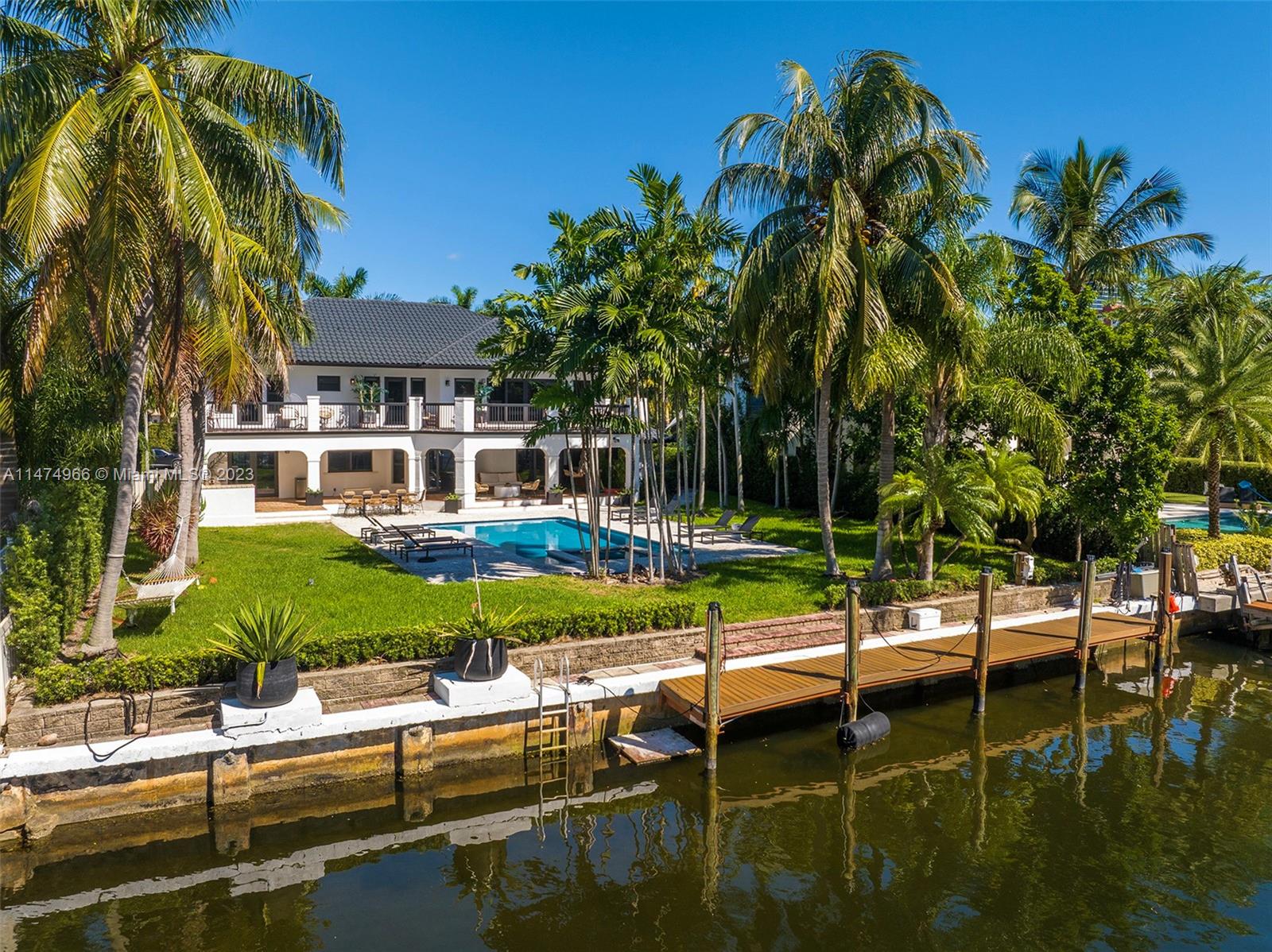Nestled in the coveted gated Golden Isles enclave, this boater's paradise boasts 85 ft of pristine waterfrontage, situated just off of the intracoastal waterway, across from Golden Beach. Every inch of this home radiates with meticulous renovations, ensuring a truly turnkey experience. Its well-conceived floorplan features spacious rooms that flow seamlessly. Store prized vehicles in a spacious 3-car garage and entertain or relax in the expansive front and back yards. The pièce de résistance: a breathtakingly large pool set against a luxurious deck backdrop. Elegance, location, and functionality – a trifecta of perfection.