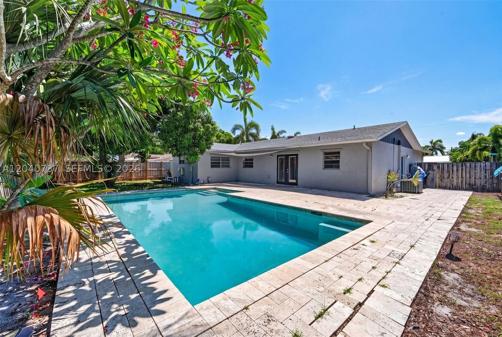Photo of 6848 NW 27th Way, Fort Lauderdale, FL 33309 (MLS # A12040737)