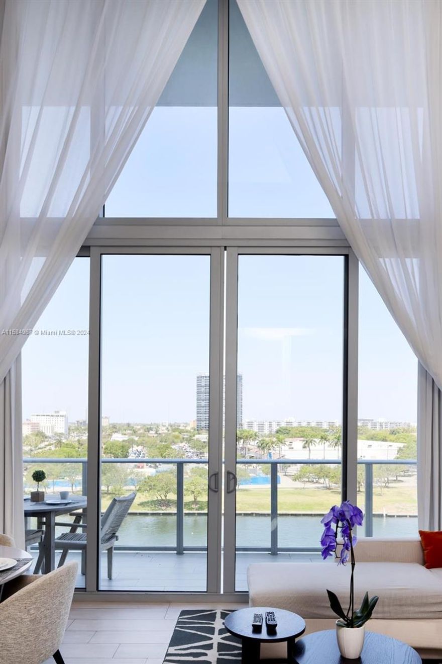 AMAZING WATER-FRONT UNIT WITH HIGH CEILINGS (18 FOOT) 3 BEDROOMS,2 BATHS,SEMI-PRIVATE ELEVATOR,BRAND NEW LUXURY CONDO-RESORT . FULLY FURNISHED, LARGE TERRACE THAT OVERLOOKS BREATHTAKING VIEWS OF THE INTRACOASTAL ,FIVE-STAR RESORT STYLE AMENITIES WITH FULL SERVICE,ACCESS TO AN OCEAN PRIVATE BEACH CLUB AND OCEAN ACCESS,TWO HEATED OVERSIZED POOLS,STATE OF THE ART GYM,COMMON AREA WITH BBQ,TENNIS COURT,HIGH SPEED INTERNET IN ALL PUBLIC AREAS.THE PERFECT VACATION HOME!!!!!