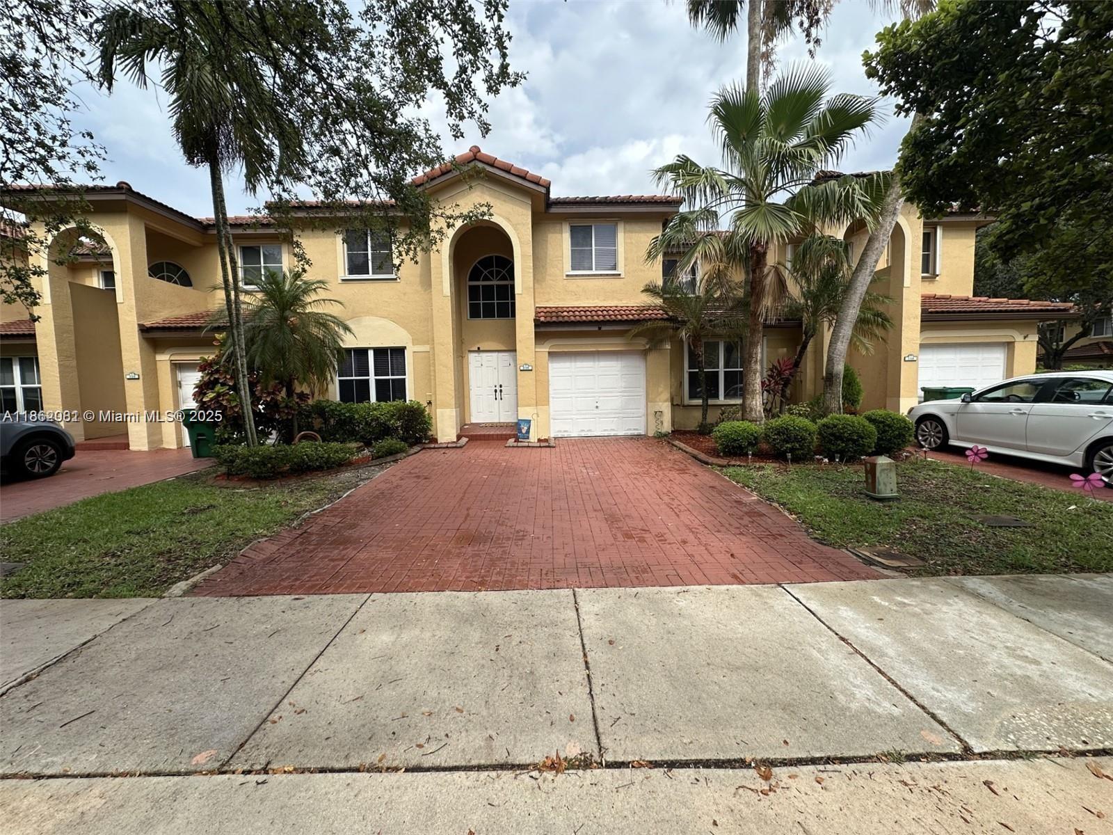 This spacious and completely updated 4-bedroom, 2.5-bath townhouse feels like a single-family home, featuring a functional open layout, LifeProof vinyl flooring, updated faucets and sinks, tankless water heater, newer A/C, private patio/yard, and a 1-car garage with plenty of guest parking. Located in a desirable gated community with 24-hour security, clubhouse, heated pool, and playground, and surrounded by A+ schools, parks, shopping, and dining, with easy access to 595, I-75, and Sawgrass Expressway. Ready to move in ASAP!