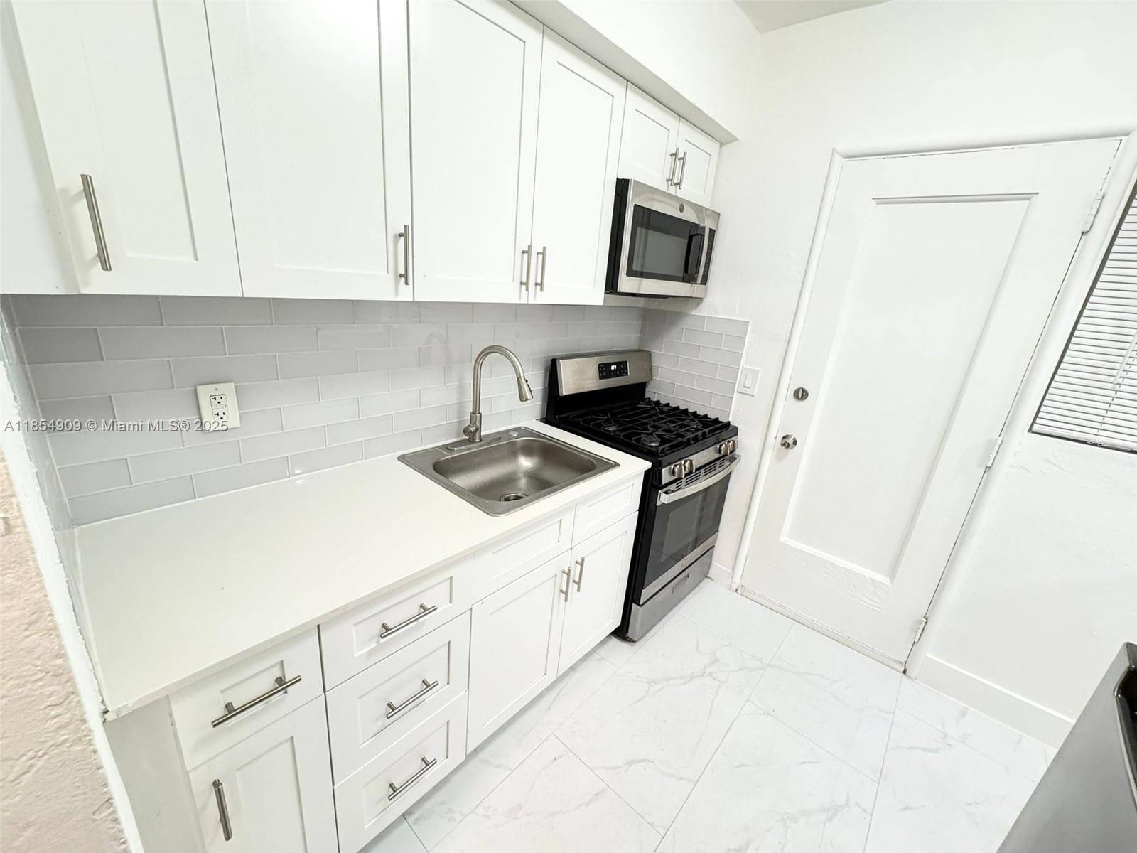 Location, Location, Location...Beautiful 1 + Den /1Bathroom completely renovated (quartz countertop), very comfortable. The apartment has been designed to maximize space and light with Private backyard. Washer/dryer on site. Great area! South Beach has the bustle, the energy, the vibrant sense of adventure — but only a few short miles away, North Beach has the relaxation and the escape.This private building is centrally located just a few blocks from the beach, major transportation, dining and entertainment. For Rent-AS IS: Cosmetic condition included.