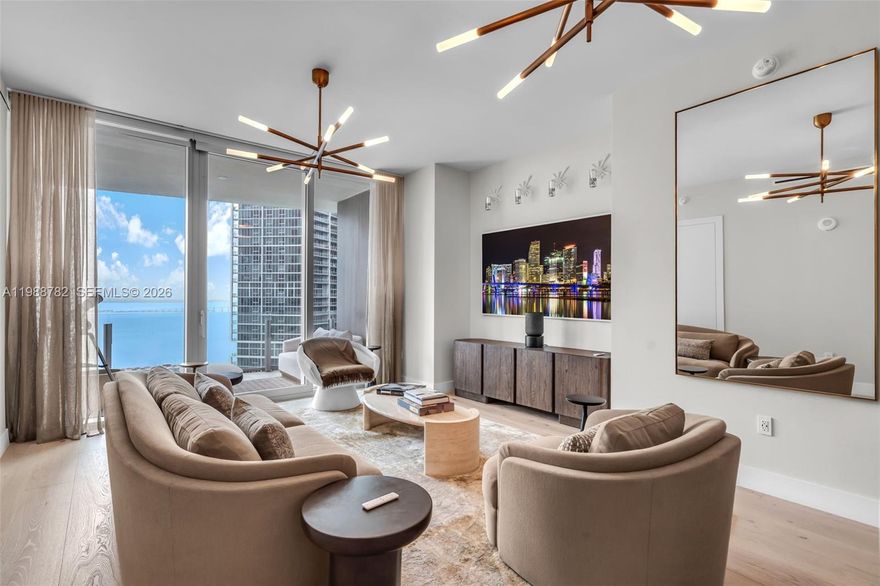 Turnkey luxury residence with breathtaking bay and skyline views. This beautifully furnished unit features floor-to-ceiling glass, a sleek open kitchen, and elegant designer interiors. Spacious primary suite with custom walk-in closet and spa-style bathroom. Experience world-class amenities in one of Miami’s most prestigious addresses.