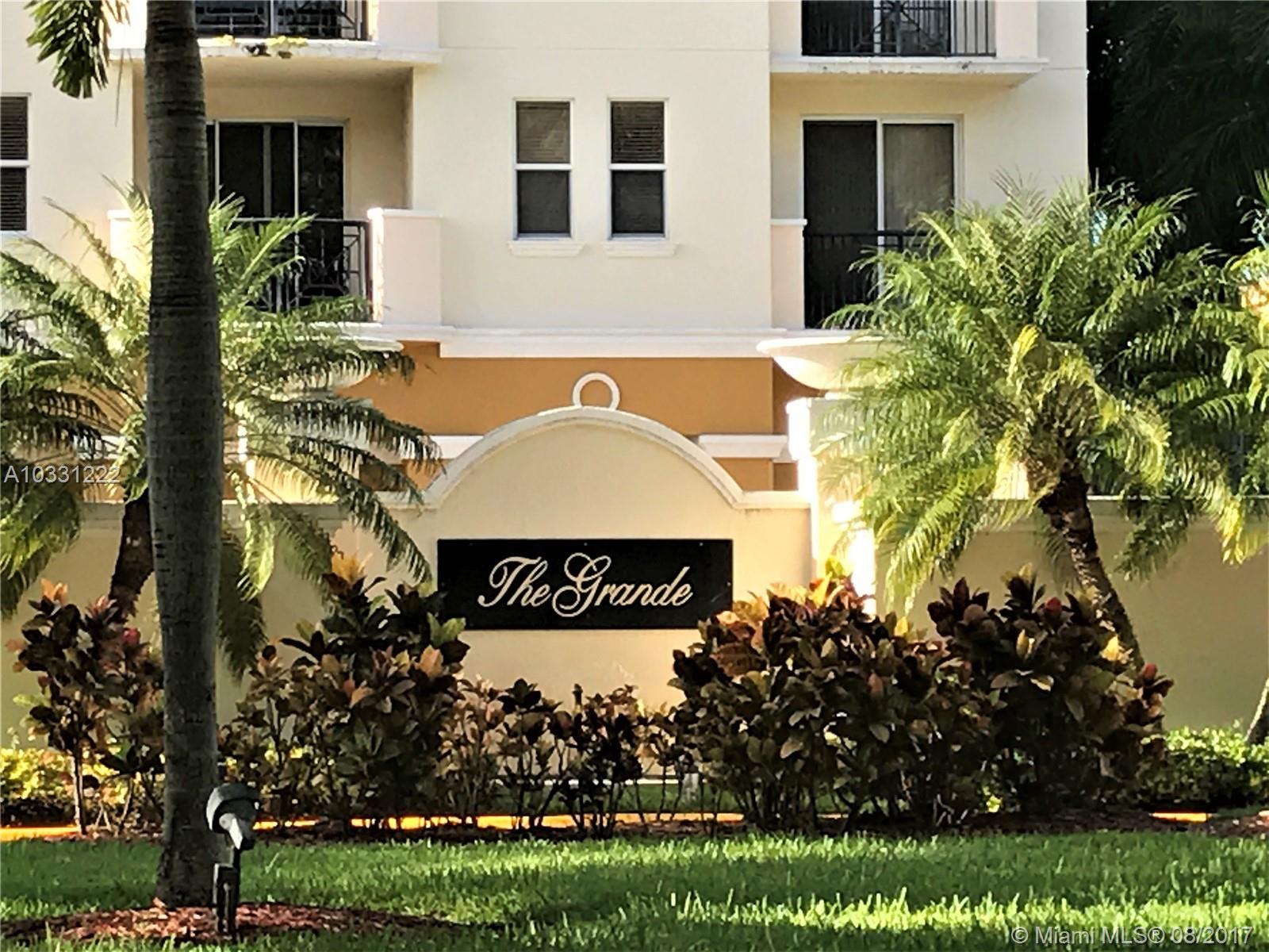 Rarely Available- Much Sought after 2/2 in "The Grande". Unique features include Custom Built-In Bar & Dressers, Custom His & Her Closets, Contemporary Master Bath with Custom Shower & Vanity. Beautiful Porcelain & Wood Floors Together with Maple Cabinets, Granite Counters, Tankless Water Heater & 2 Parking Spaces make This an Outstanding Value in this Baptist Area Boutique Building 

*Pool * Jacuzzi * State Of The Art Gym * Bike Racks, Security & More!! Hurry...Don't Let This One Get Away!!