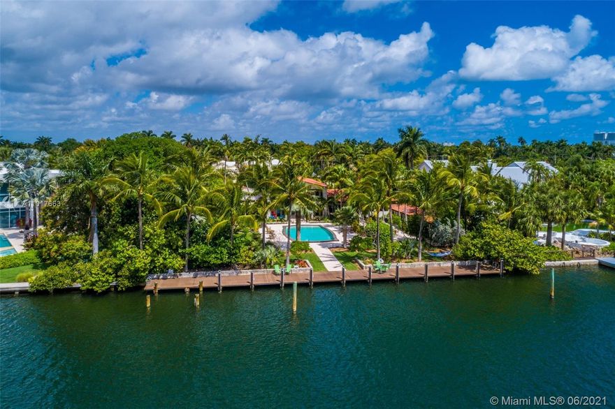 Pristine & Elegant Waterfront Estate on 150 feet of waterfront (150’ x 231’ Lot), wide-open water views, southern exposure, deep-water w/ocean access. Complete $3.4M expansion & renovation in 2007.  Rare opportunity on almost a builder’s acre w/lush vegetation offering privacy to its residents. A relaxed resort style getaway w/stunning sunrises & sunsets.  Rooftop terrace & large heated swimming pool make for grand scale parties & impromptu entertaining year-round. Main Home Features 6BR/5.5BA, open living spaces, impact windows/doors, top of the line gas kitchen w/Calacatta counters & adjacent family room. Additionally, and very uncommon is a separate Guesthouse w/full kitchen, living & 1BR/1BA. Private waterfront dock accommodates large yacht perfect to enjoy the South Florida Lifestyle.
