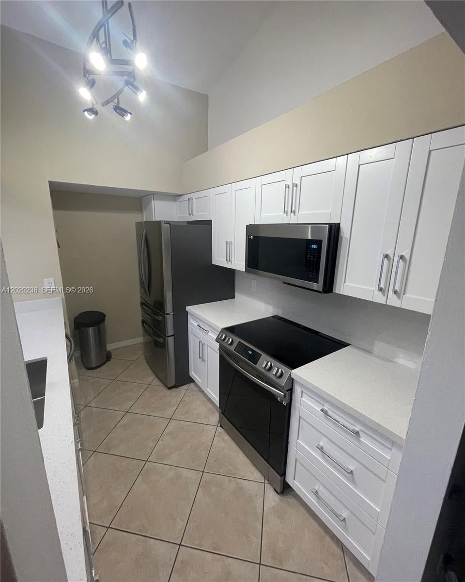 Photo of 12351 NW 11th Ct, Pembroke Pines, FL 33026 (MLS # A12029236)
