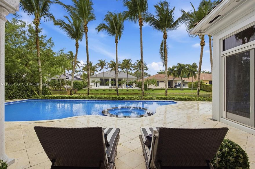 Where exclusivity meets effortless luxury—welcome to Hawks Landing, one of Plantation’s most coveted private enclaves. This exceptional residence on highly sought after Sweet Bay Ave offers a spectacular waterfront estate with five bedrooms, office and 3 car garage. The first level features: your primary suite with waterfront views and two walk in closets, an office, en-suite bedroom, updated chefs kitchen with breathtaking marble countertop and backsplash, stainless steel Thermodore appliances and gas stove, family room and full cabana bath. Second level features: loft with three en-suite bedrooms and a beautiful balcony. A personal paradise with oversized patio area perfect for entertaining with updated pool and spa, wide water views, awning covering your built in grill, mounted TV and mini fridge. A lifestyle defined by elegance, privacy, and world-class amenities, all within a 24-hour guard-gated and patrolled community. Indulge in resort-style living with access to your private clubhouse, state-of-the-art fitness center, tennis, basketball and pickleball courts, a vast community pool and monthly events to meet neighbors and network. This home provides seamless access to everything South Florida has to offer while maintaining a serene, private setting. Surrounded by lush landscaping and distinguished estates, Hawks Landing represents luxury living, exclusivity and charm.