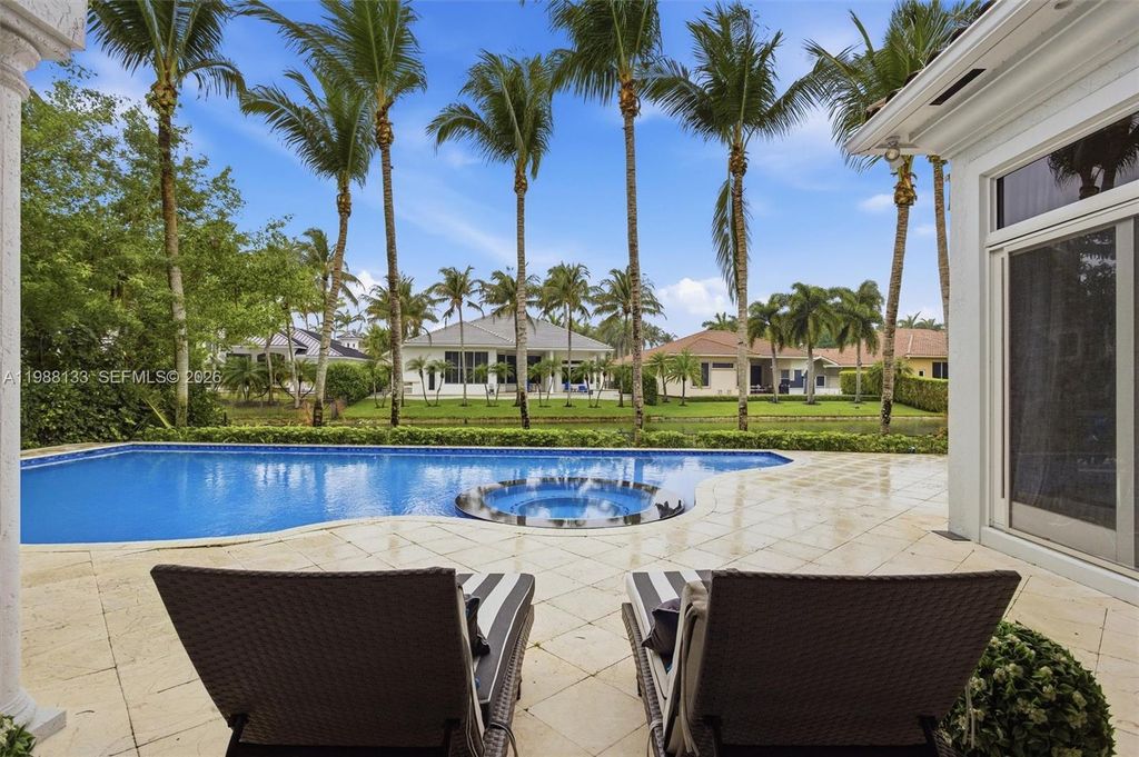 Photo of 611 Sweet Bay Ave, Plantation, FL 33324 (MLS # A11988133)