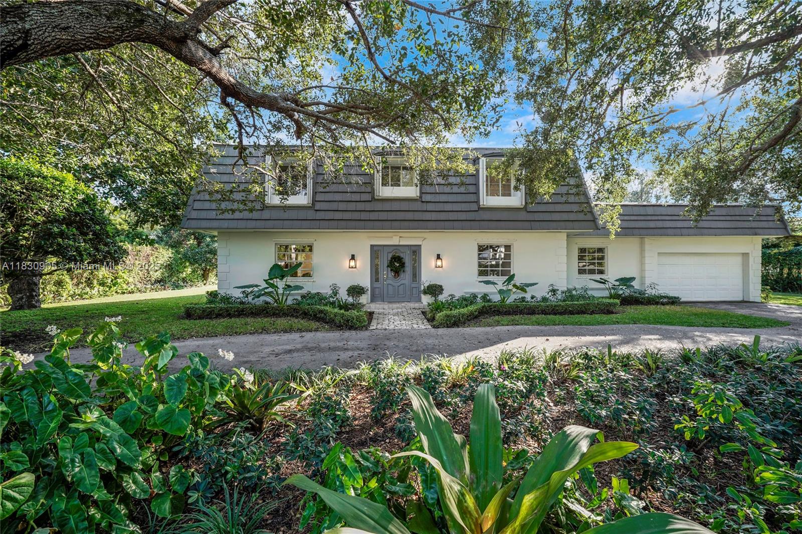 Rare Opportunity in South Coral Gables – Spacious Home with Guest Cottage
Located in one of South Coral Gables' most desirable neighborhoods, this spacious two-story home sits on over half an acre and offers 6 bedrooms, 4.5 bathrooms, and Saturnia marble floors. The open layout includes formal dining and a gourmet kitchen with granite countertops and high-end appliances. A large covered patio overlooks lush landscaping with mature avocado and mango trees. A separate 2-bedroom, 1-bath cottage adds flexibility for guests or office use. Conveniently located near top-rated schools, dining, hospitals, and parks. Lawn maintenance included.