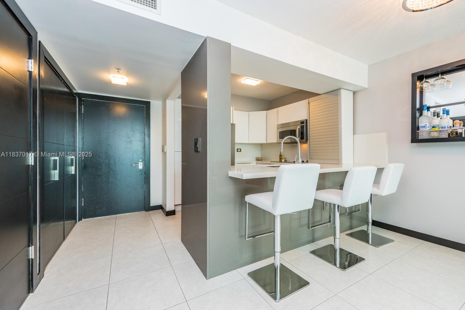 Welcome to Unit 2209 at Brickell on the River – a high-floor residence with beautiful views of the Miami River and city skyline. This unit offers a layout designed for both function and flow, with floor-to-ceiling windows that invite in natural light throughout the day. Unit is fully remodeled. Pictures speak for themselves.
Located steps from the Metromover, Brickell City Centre, and the riverwalk. Amenities include a two-story fitness center, spa, pool deck, and 24-hour concierge.