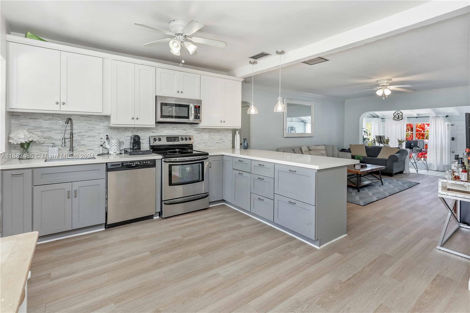 Welcome to your dream beach cottage! This beautiful 3-bedroom, 2-bath home is a true tropical paradise, radiating natural light and featuring spacious living areas. Nestled on one of the largest lots in the neighborhood, it offers ample space for outdoor enjoyment. The modern kitchen is equipped with updated appliances and stylish finishes, perfect for culinary creations. Step outside to your own oasis, complete with a refreshing pool, lush landscaping, and fruit-bearing mango, avocado, and lemon trees. Just a short stroll to the beach, this home provides the ideal blend of tranquility and convenience. Embrace the ultimate coastal lifestyle in this thoughtfully designed cottage. Don’t miss your chance to own this slice of paradise!